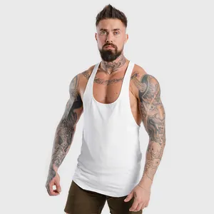Professional close-up of a white muscle-fit stringer tank top on a fit male model