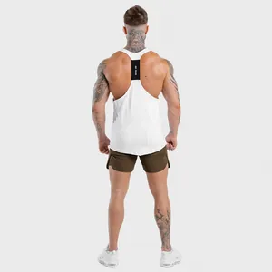 Detailed back view of a white fitness tank top featuring a black GO HARD racerback strap