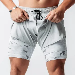 Detailed view of men's quick-dry 2-in-1 running shorts with gray camo inner layer