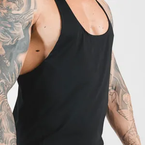 Detail view of a black men's muscle gym stringer tank top on a fit model