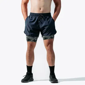 Detail view of men's double-layer quick-drying athletic shorts featuring camo inner compression liner