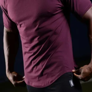 Close-up of maroon slim-fit muscle t-shirt showing fabric texture and athletic drape