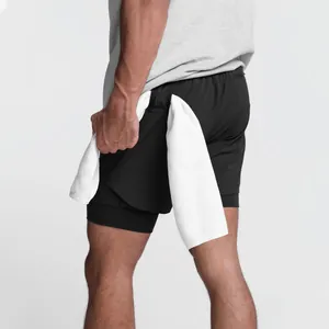 Detail view of men's 2-in-1 running shorts featuring a functional towel loop design.