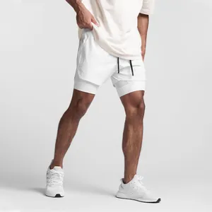 Detail view of men's white double-layer athletic shorts with breathable mesh inner