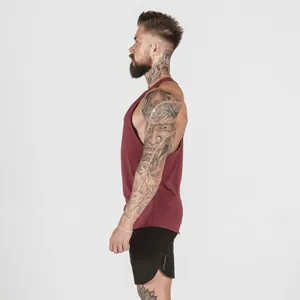 Detailed side view of a maroon men's fitness tank top made with breathable performance fabric