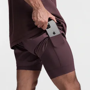 Detailed view of men's 2-in-1 athletic shorts showing the secure built-in phone pocket