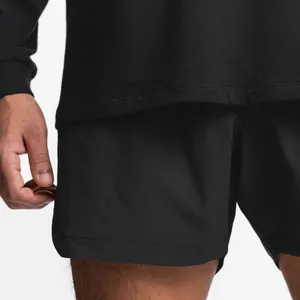 Close-up of high-quality breathable fabric on black men's athletic training shorts