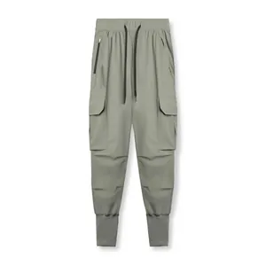 Pantalon cargo de sport pour homme vert olive avec cordon de serrage et poignets