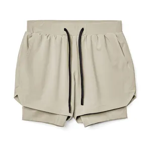 Khaki double-layer men's quick-dry sports shorts for running and fitness flat lay view