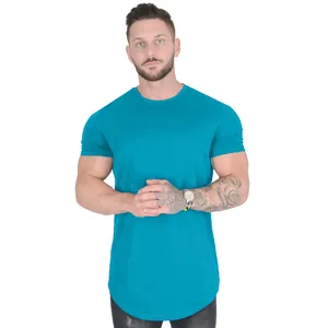 Stylish men's solid turquoise short sleeve cotton t-shirt with athletic fit on a model