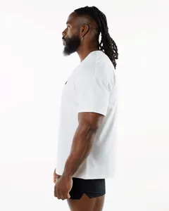 Side profile view of a men's white crew neck athletic t-shirt in a relaxed fit.