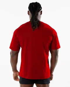 Back view of a red crew neck sports t-shirt for men shown on a professional male model.