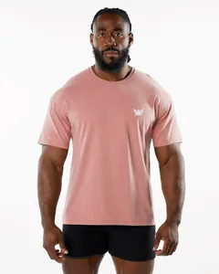 Front view of men's dusty pink athletic crew neck t-shirt on fitness model