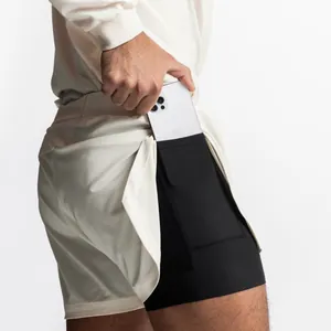 Detailed view of men's 2-in-1 athletic shorts featuring a hidden inner phone pocket