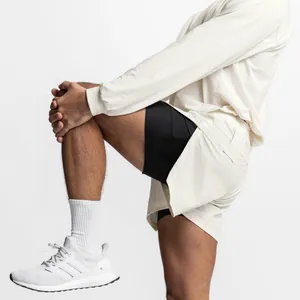 Close-up of men's breathable sports training shorts with inner compression layer