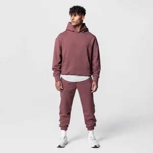 Full view of a men's maroon sports tracksuit featuring a 320g cotton hoodie and sweatpants.