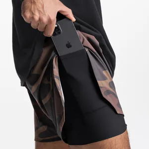 Detail view of men's 2-in-1 sports shorts showing internal phone pocket