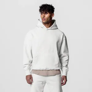 Vue professionnelle d'un ensemble de sweat à capuche blanc ample pour hommes en coton