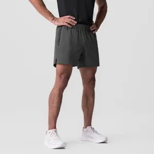 Pantalones cortos deportivos para hombre verde oliva de secado rápido con bolsillos con cremallera