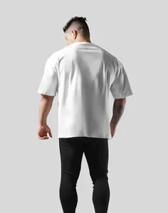 Detailed back view of a white oversized men's fitness t-shirt with a back neck logo