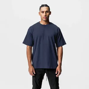 Front view of a men's loose fit navy blue cotton sports T-shirt with round neck.