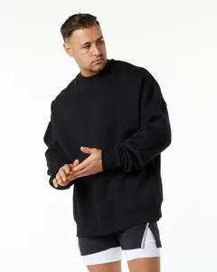 Detail view of oversized black 400G fleece crewneck sweatshirt for men