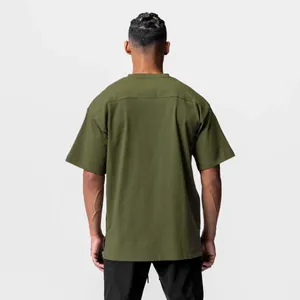 Back view of men's olive green oversized sports t-shirt with loose fit and drop shoulder.
