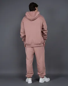 Back view of heavyweight dusty rose oversized fleece hoodie and sweatpants set.