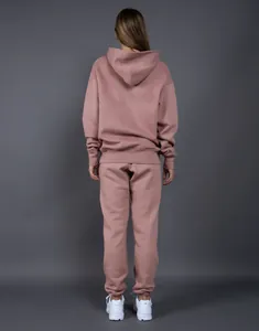 Back view of a 400G heavyweight fleece oversized hoodie and jogger set in dusty rose.