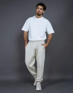 Pantaloni tuta uomo 400G felpati bianco sporco, pantaloni sportivi larghi casual per l'inverno.