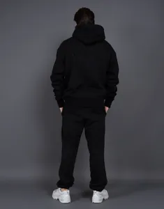 Back view of heavyweight black fleece hooded sweatshirt and jogger pants set for men