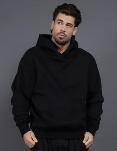 Front view of 400G heavy fleece black hooded sweatshirt with loose drop shoulder fit