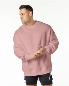 Detailed shot of an oversized mauve crewneck sweatshirt with dropped shoulders fit