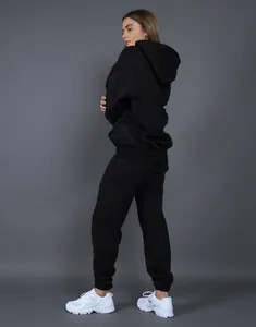 Premium oversized black fleece-lined hoodie and matching joggers tracksuit set for winter comfort
