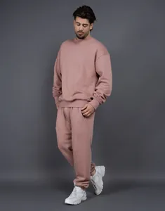 Conjunto de chándal rosa para hombre con sudadera de cuello redondo y pantalón holgado