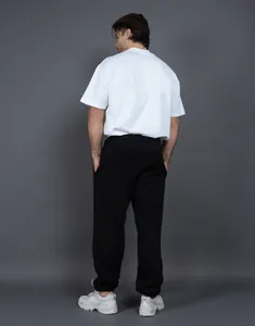 Vista posteriore di pantaloni sportivi pesanti in pile da 400g in vestibilità ampia