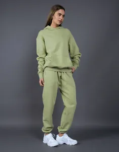 Full body view of women's sage green oversized 400G fleece hoodie and matching joggers set