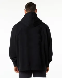 Back view detail of a heavyweight black hooded sweatshirt for men in a loose fit