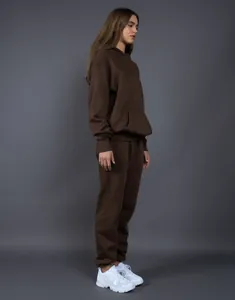 Side view of chocolate brown oversized fleece-lined hooded tracksuit for winter