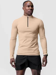 Ανδρική αθλητική μπλούζα slim-fit με μακρύ μανίκι και μισό φερμουάρ σε μπεζ χρώμα