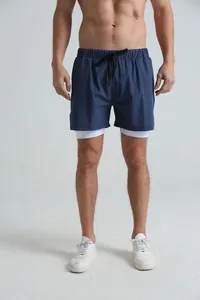 Close-up of navy blue double-layer men's sports shorts with quick-dry white lining