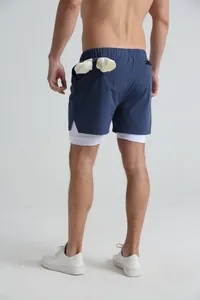 Back view of men's navy blue double-layer sports shorts with white quick-dry lining