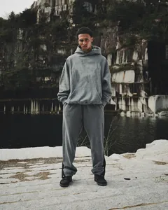 Set felpa grigia con cappuccio e pantaloni sportivi con bottoni laterali uomo