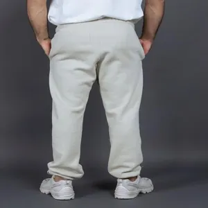 Vista posteriore dei pantaloni sportivi oversize foderati in pile da 400g grigio chiaro