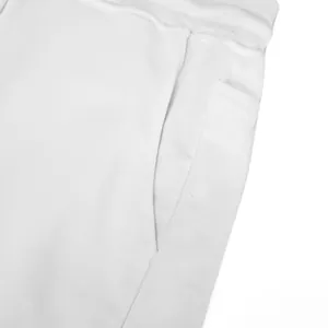 Detailed close-up showing the side pocket and fabric texture of white cotton sports shorts