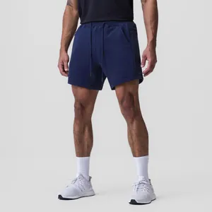 Detail view of men's breathable navy blue athletic shorts for running and gym workouts