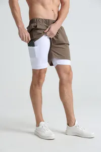 Detail view of men's 2-in-1 sports shorts showing the white liner with phone pocket