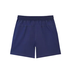Rear view of navy blue men's breathable cotton athletic shorts with elastic waistband.