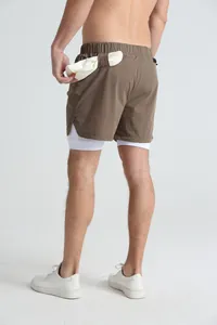 Back view of brown 2-in-1 men's athletic shorts showing the functional towel loop detail
