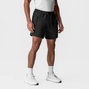 Detailed view of men's black breathable cotton sports shorts for gym and running.
